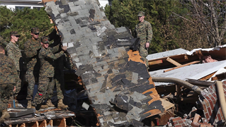 A home is shown in disarray. 