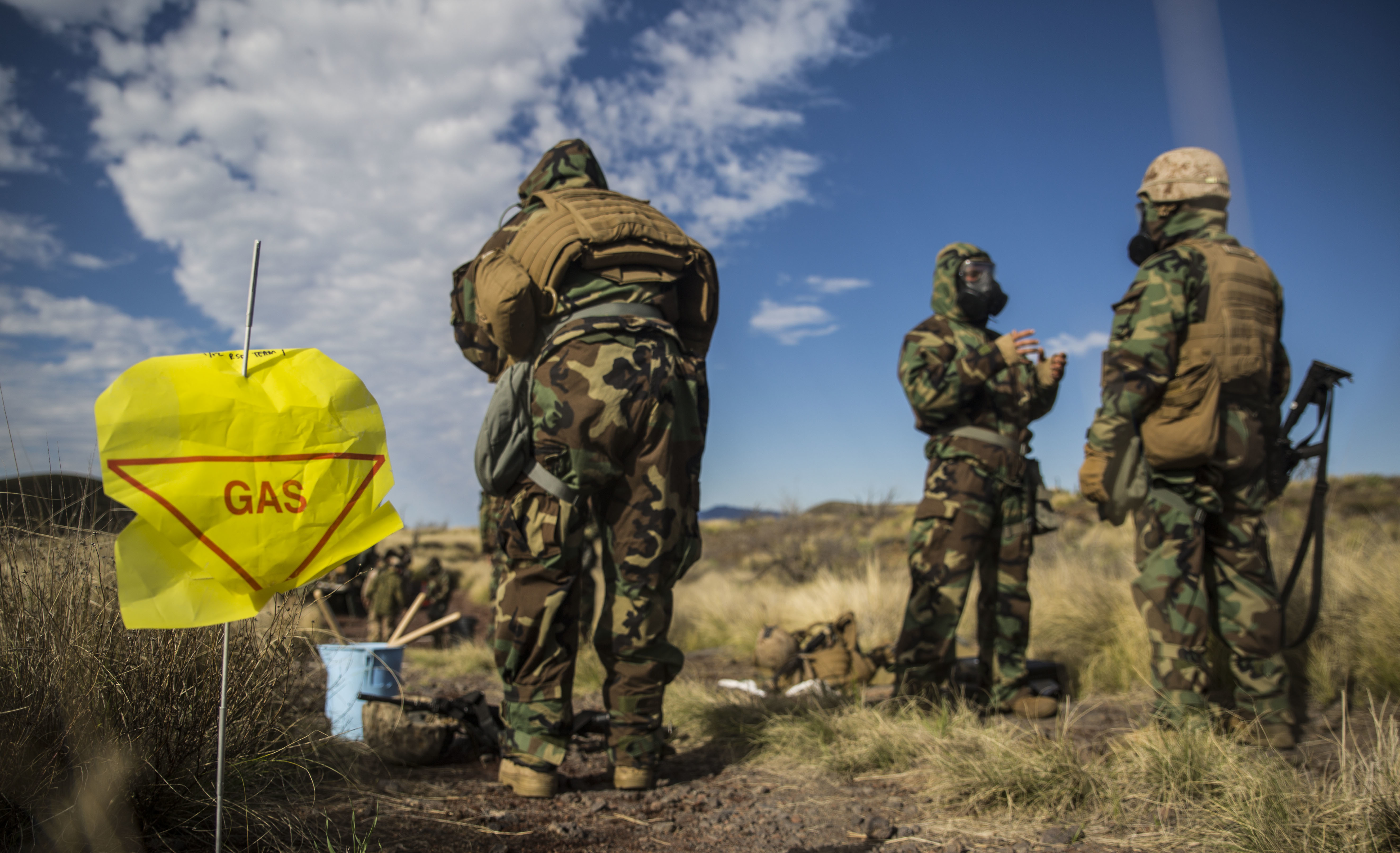 Marines participate in an exercise involving gas.